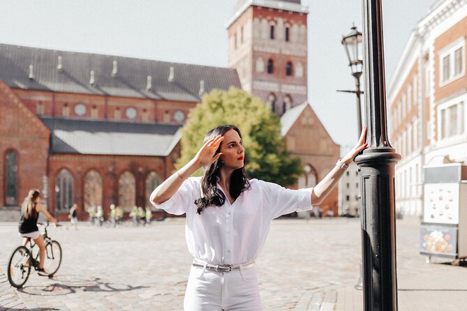 1H Private Photoshoot in Old Town of Riga - Laima Clock finishes with a familiar Riga symbol