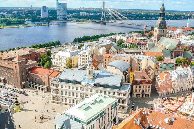 Discover Riga’s most Photogenic Spots with a Local - Big Christopher beside the river