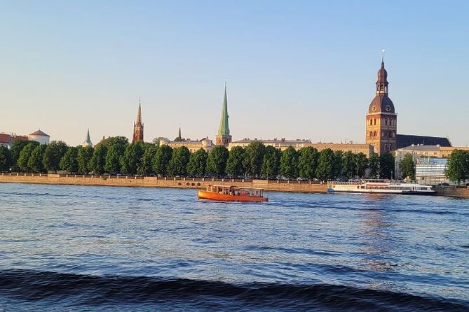 Riga Canal and Daugava Boat Tour with Welcome Drink & Audio Guide - Why a canal cruise is a smart way to meet Riga