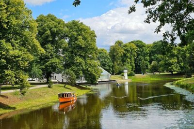 Riga Canal and Daugava Boat Tour with Welcome Drink & Audio Guide