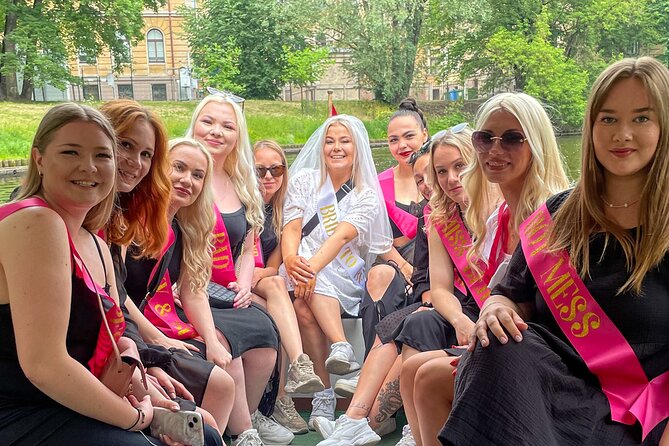 Riga Sightseeing Tour by Canal Boat with Audioguide - Central Market and the National Library from the Water