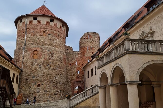 Riga to Vilnius - Sightseeing transfer - Lunch, comfort, and the long road south